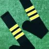 Baseball Full Length Black Sock With Three Gold Stripes With White Trim 1 Baseball Full Length Black Sock With Three Gold Stripes With White Trim -Baseball Equipment Store FullSizeRender 32